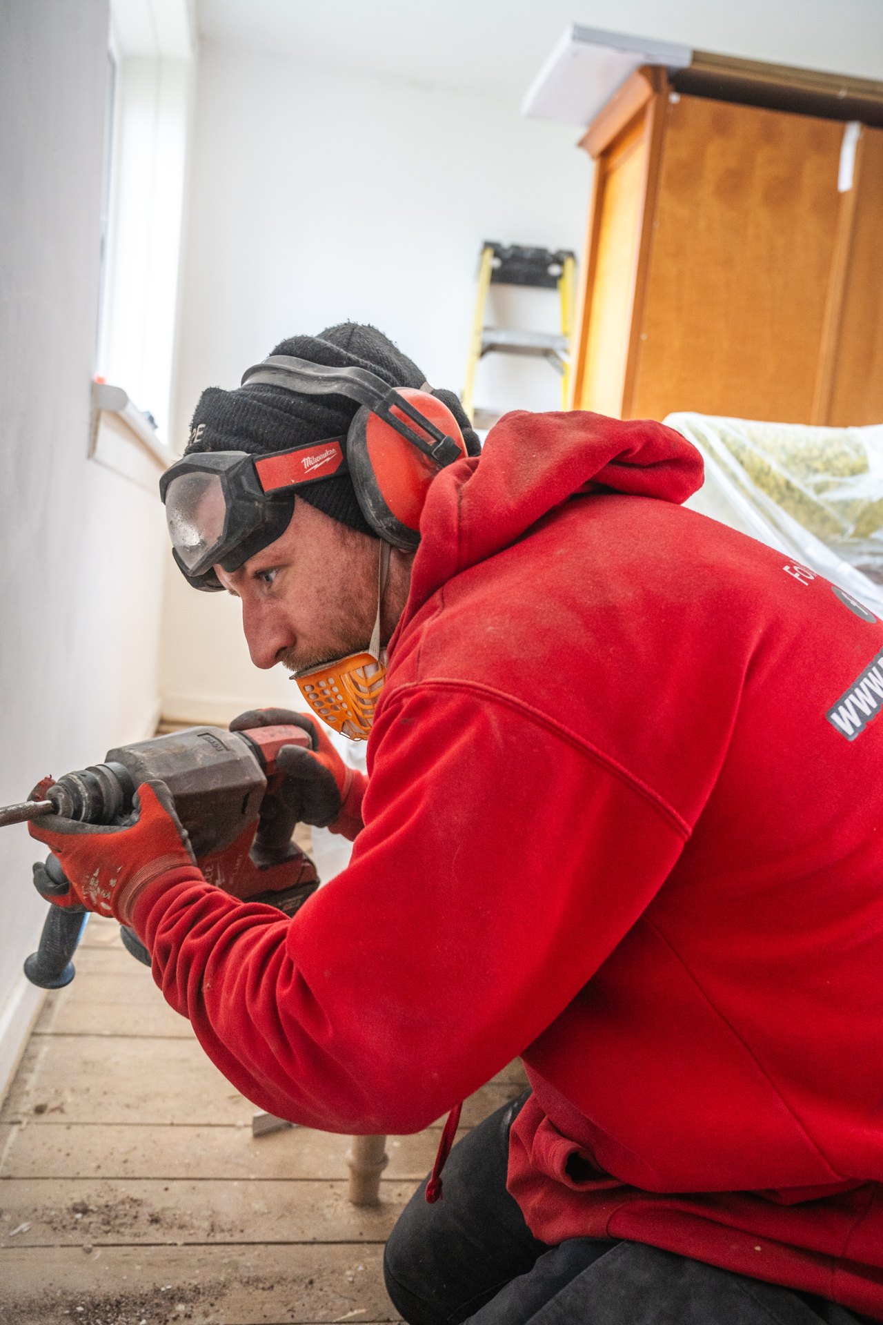 Project Rewire electrician carrying out rewiring work